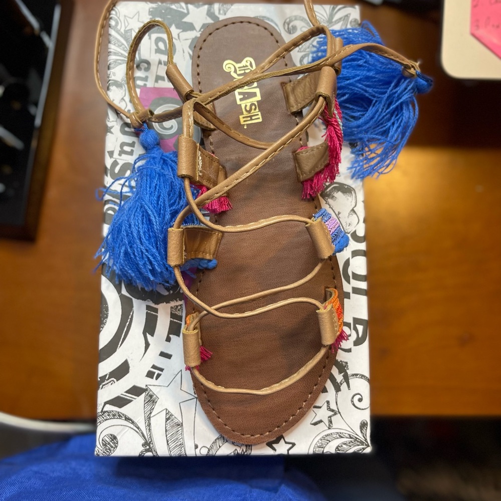 SOLD!!!!!!Tie up sandals. Never worn